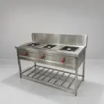 Commercial kitchen equipment supplier in Hyderabad, Telangana with stainless steel cooking range.