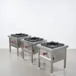 Commercial kitchen equipment supplier in Hyderabad, Telangana with stainless steel cooking range.