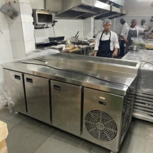 Commercial kitchen equipment supplier in Hyderabad, Telangana with stainless steel cooking range.