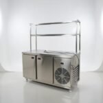 Commercial kitchen equipment supplier in Hyderabad, Telangana with stainless steel cooking range.