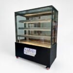 Hotel kitchen equipment manufacturer in Hyderabad, Telangana with oven and exhaust system.