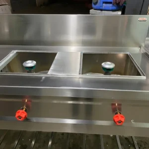 Heavy-duty gas cooking range for commercial kitchens in Hyderabad, Telangana.