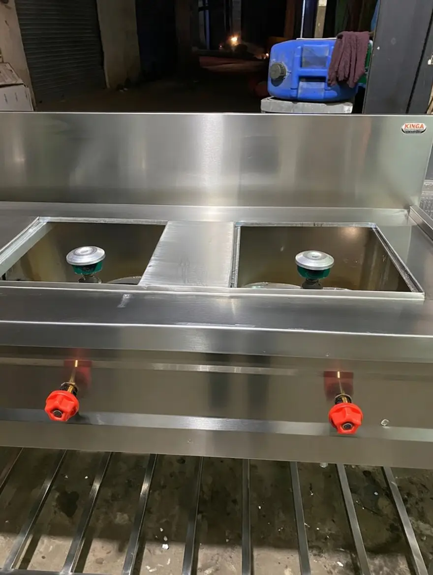 Heavy-duty gas cooking range for commercial kitchens in Hyderabad, Telangana.